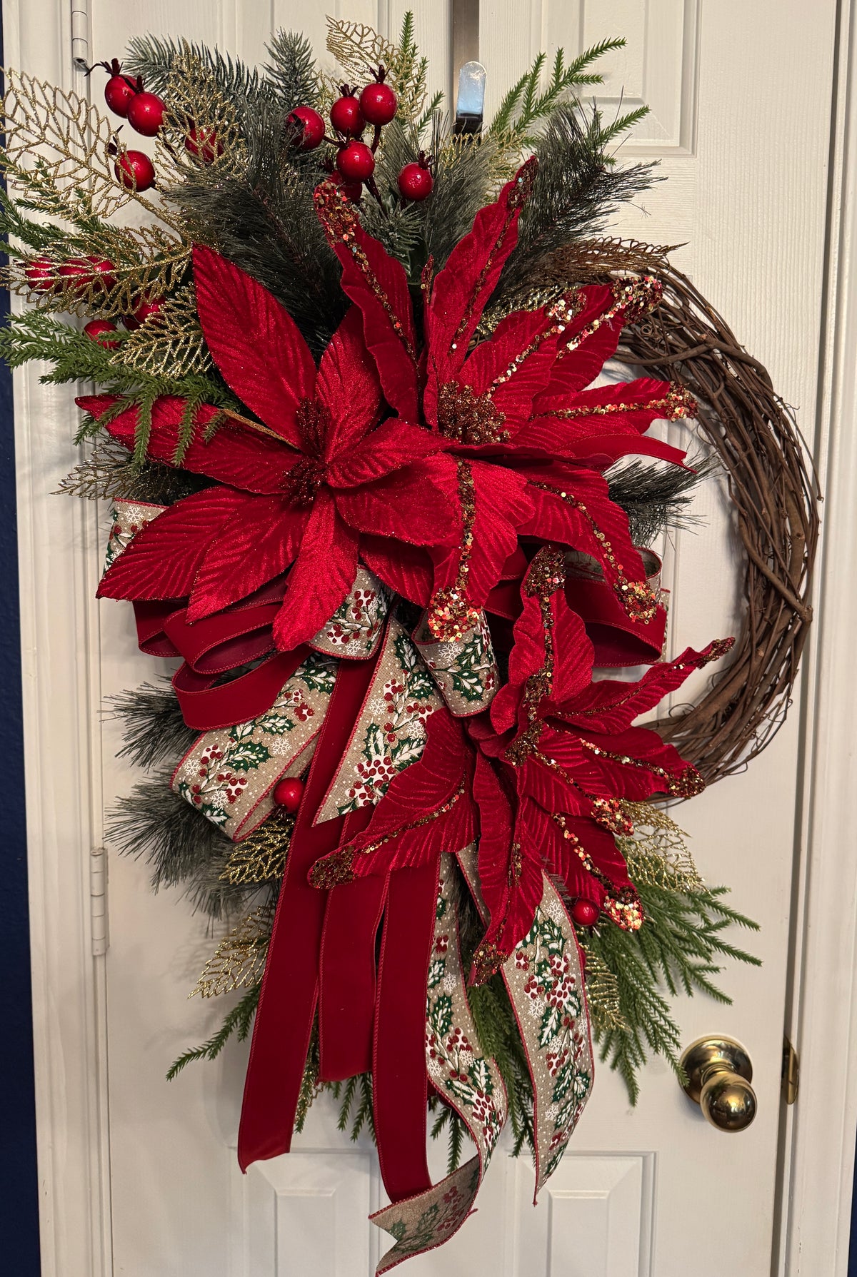 Red Velvet Poinsettia Grapevine Wreath